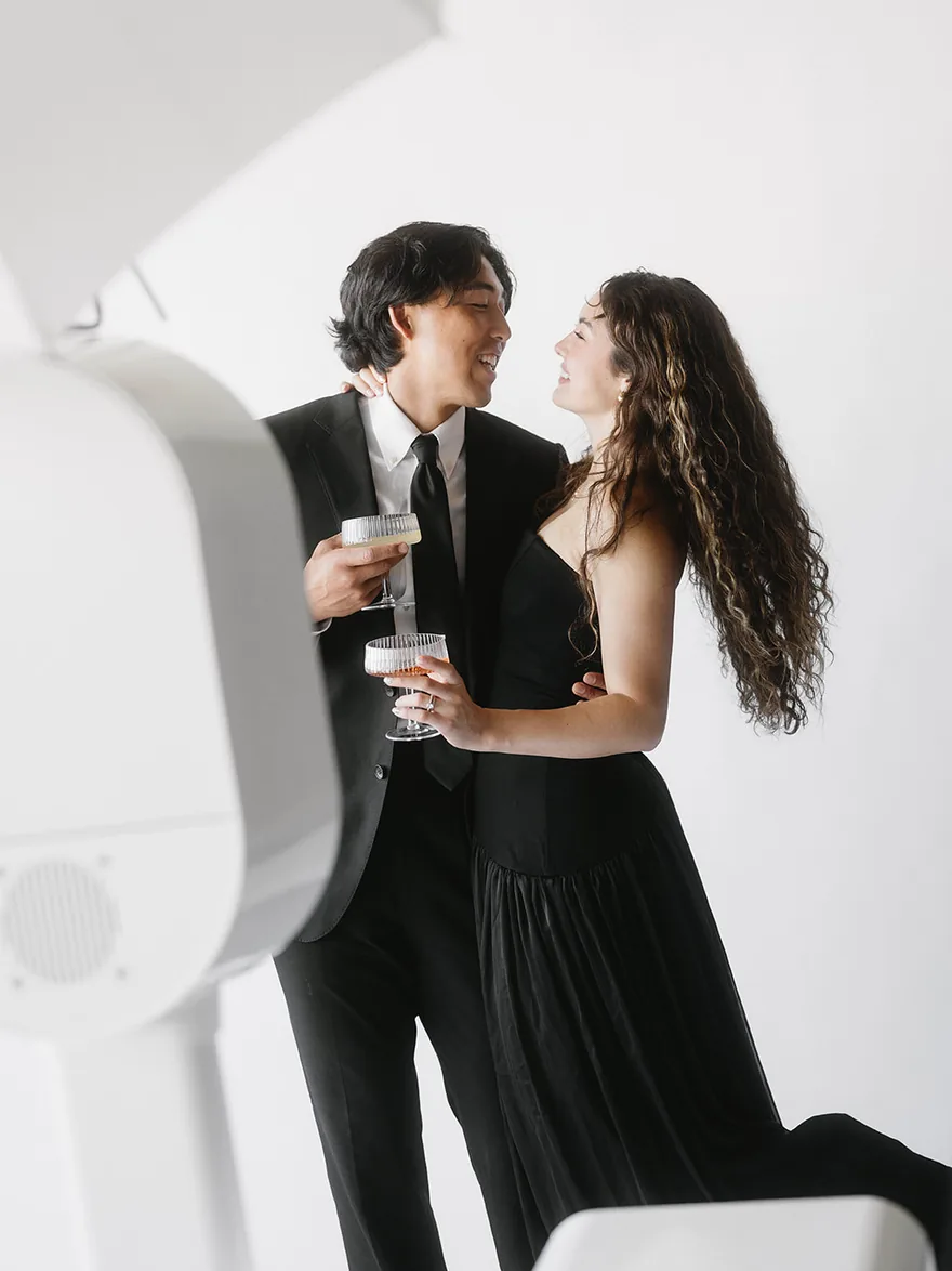 Couple posing together at a San Diego photo booth
